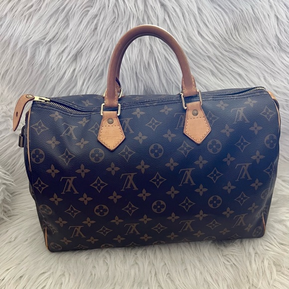 Louis Vuitton Handbags - LV Speedy